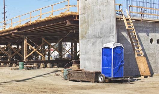 ensuring proper sanitation at the work site with these porta potties